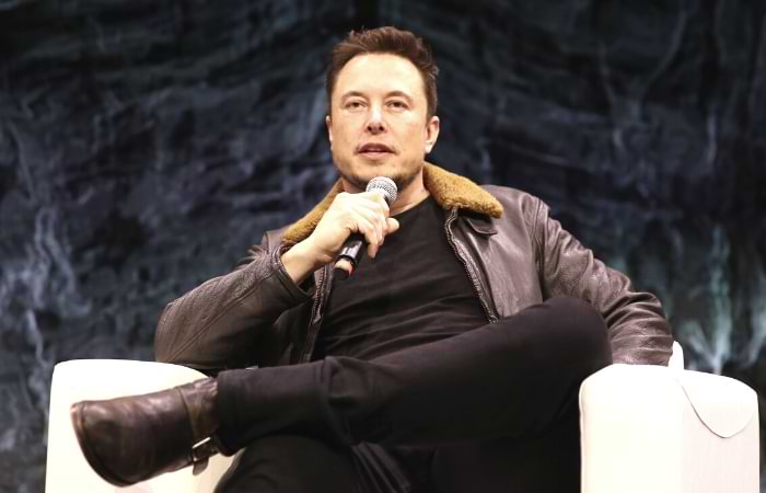 Why did Elon Musk name his company Tesla?